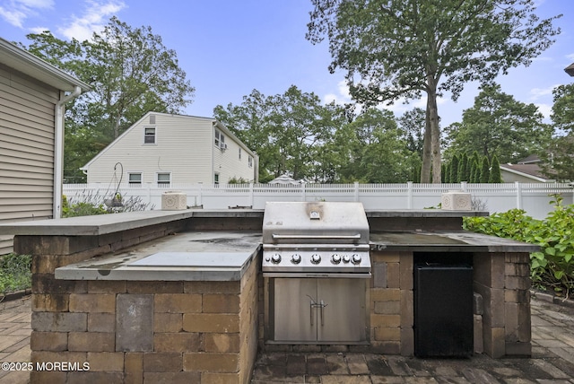 1587 Fort St, Brick, NJ 08724 - fenced backyard featuring exterior kitchen