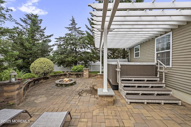 1587 Fort St, Brick, NJ 08724 - view of patio / terrace featuring a hot tub, an outdoor fire pit, and a pergola