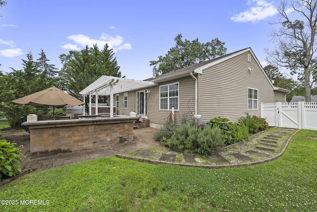 1587 Fort St, Brick, NJ 08724 - back of property featuring a gate, a patio area, and a pergola