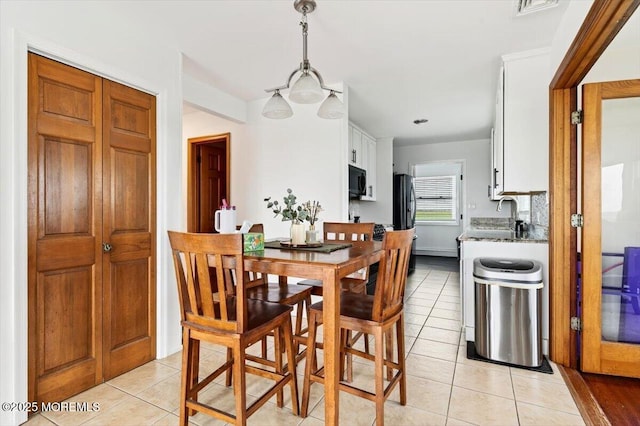 322 Dock Rd, West Creek, NJ 08092 - dining space featuring light tile patterned floors