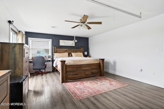 322 Dock Rd, West Creek, NJ 08092 - bedroom with wood finished floors, ceiling fan, and a desk