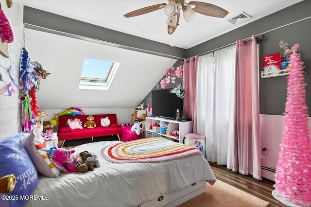 322 Dock Rd, West Creek, NJ 08092 - bedroom with a skylight, wood finished floors, a baseboard radiator, lofted ceiling, and ceiling fan
