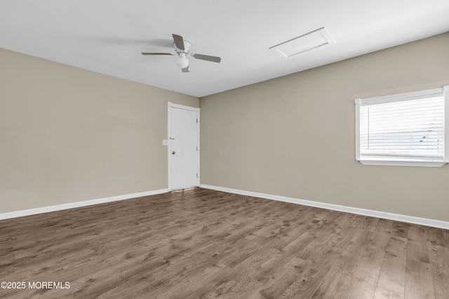 971 Center St, Little Egg Harbor, NJ 08087 - unfurnished room featuring wood finished floors, ceiling fan, and attic access