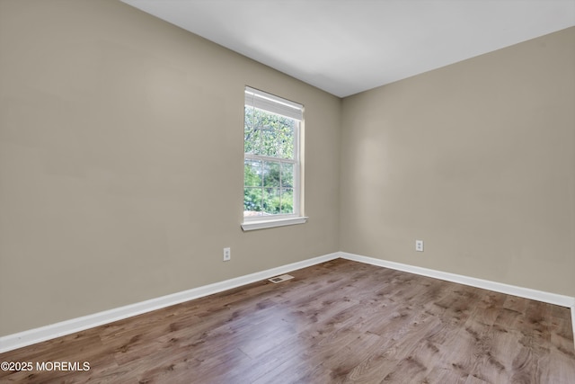 971 Center St, Little Egg Harbor, NJ 08087 - spare room with baseboards and wood finished floors