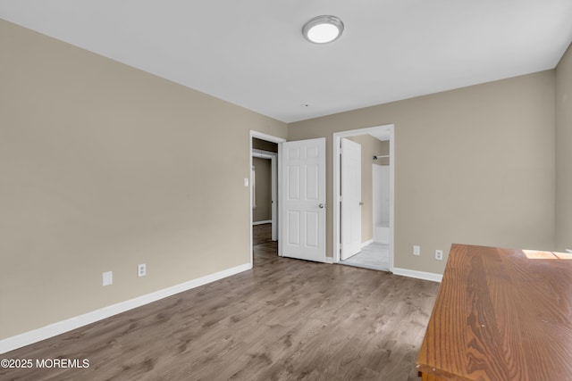 971 Center St, Little Egg Harbor, NJ 08087 - unfurnished bedroom featuring wood finished floors and ensuite bathroom