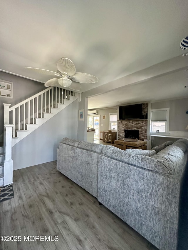 224 5th St Unit A, Beach Haven, NJ 08008 - living area with wood finished floors, healthy amount of natural light, stairway, and a fireplace
