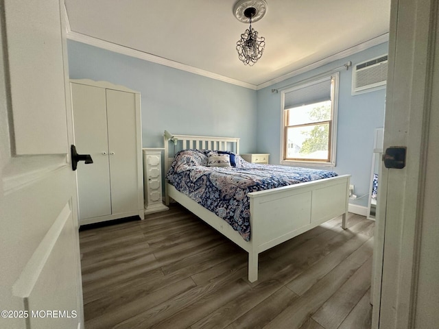 224 5th St Unit A, Beach Haven, NJ 08008 - bedroom with crown molding, dark wood finished floors, and an AC wall unit