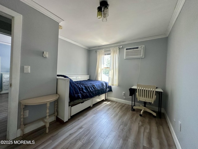 224 5th St Unit A, Beach Haven, NJ 08008 - bedroom featuring a wall mounted air conditioner, wood finished floors, and crown molding