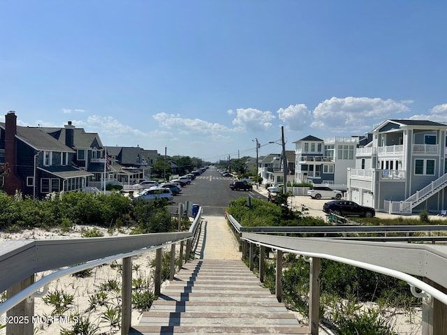 224 5th St Unit A, Beach Haven, NJ 08008 - view of asphalt road featuring a residential view, sidewalks, and street lights