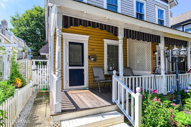 132 Heck Ave, Ocean Grove, NJ 07756 - view of exterior entry featuring a porch