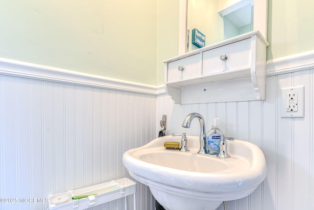 132 Heck Ave, Ocean Grove, NJ 07756 - bathroom featuring a wainscoted wall and a decorative wall