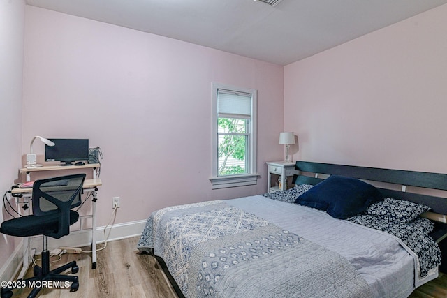 132 Heck Ave, Ocean Grove, NJ 07756 - bedroom featuring wood finished floors and an office area