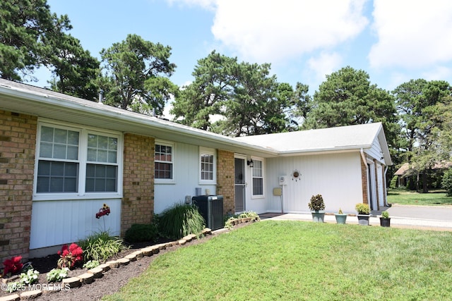 8B Cambridge Cir, Manchester, NJ 08759 - single story home featuring a front lawn and brick siding