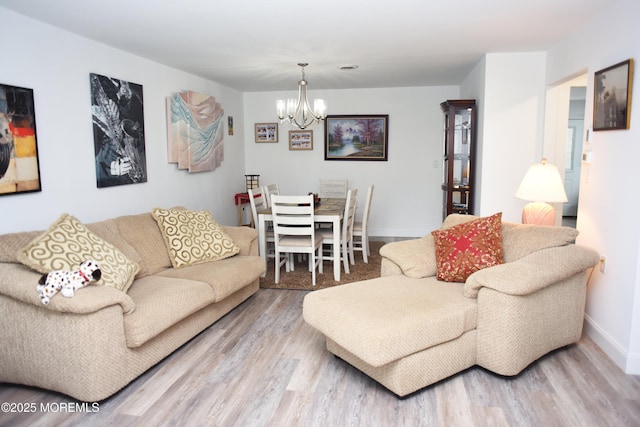 8B Cambridge Cir, Manchester, NJ 08759 - living room with a chandelier and wood finished floors