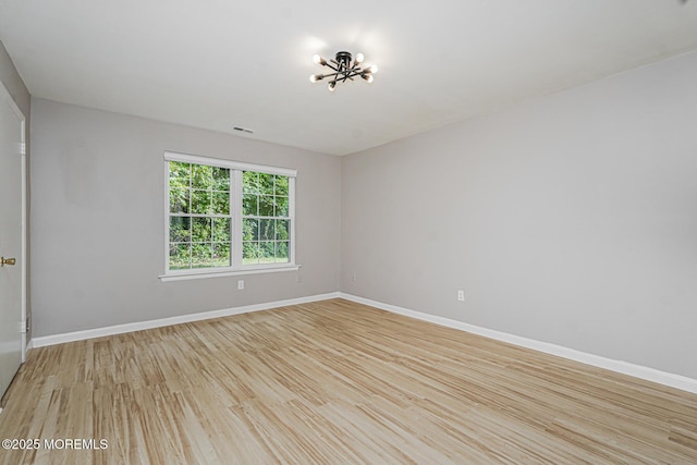 701 Zlotkin Cir Unit 1, Freehold, NJ 07728 - unfurnished room featuring light wood-style floors and baseboards