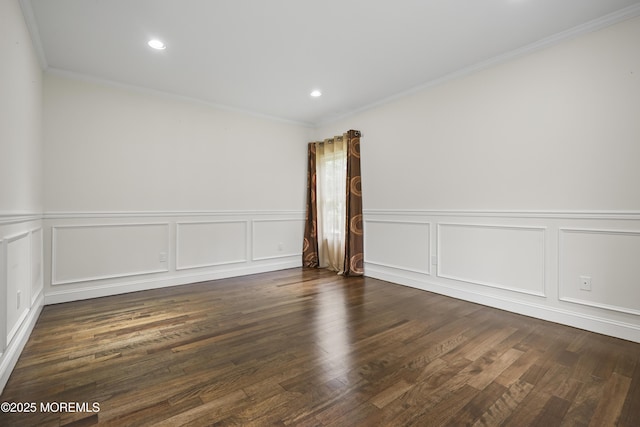 29 Lorton Rd, Old Bridge, NJ 08857 - spare room featuring crown molding, a decorative wall, dark wood-style flooring, a wainscoted wall, and recessed lighting