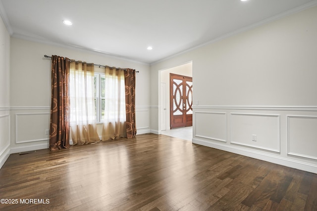 29 Lorton Rd, Old Bridge, NJ 08857 - empty room with a decorative wall, ornamental molding, wood finished floors, a wainscoted wall, and recessed lighting