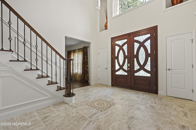 29 Lorton Rd, Old Bridge, NJ 08857 - entryway with a towering ceiling, stairs, and marble finish floors