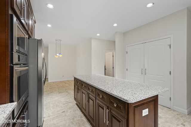29 Lorton Rd, Old Bridge, NJ 08857 - kitchen featuring a center island, appliances with stainless steel finishes, recessed lighting, dark brown cabinets, and hanging light fixtures