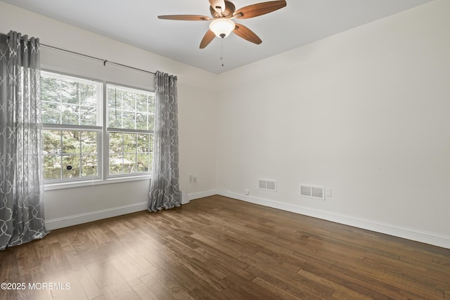 29 Lorton Rd, Old Bridge, NJ 08857 - empty room with ceiling fan and dark wood-style floors