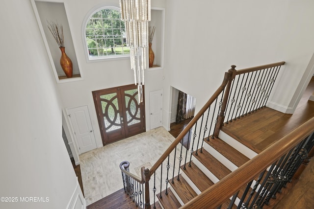 29 Lorton Rd, Old Bridge, NJ 08857 - entryway with wood finished floors, a high ceiling, and stairs