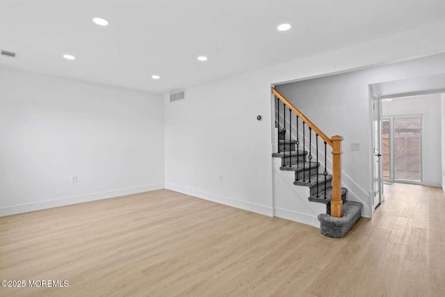 256 Greenwood Loop Rd, Brick, NJ 08724 - unfurnished room with wood finished floors, recessed lighting, and stairs