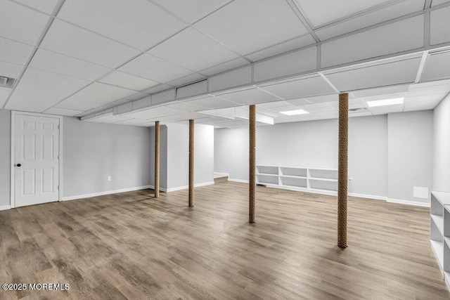 1207 Bayberry Rd, Manasquan, NJ 08736 - finished basement with wood finished floors and a drop ceiling