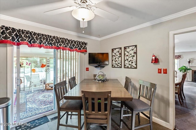 23 Spring St, Franklin Twp, NJ 08873 - dining room with healthy amount of natural light, ornamental molding, and ceiling fan