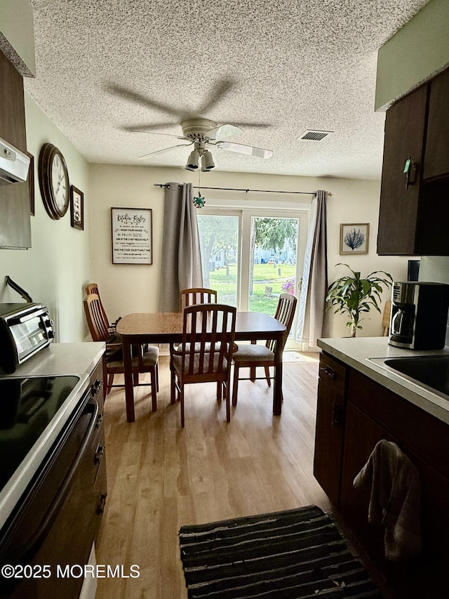 7 S Seas Ct, Barnegat, NJ 08005 - dining area featuring ceiling fan, light wood-style flooring, and a textured ceiling