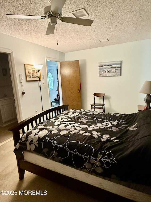 7 S Seas Ct, Barnegat, NJ 08005 - carpeted bedroom featuring a textured ceiling and ceiling fan