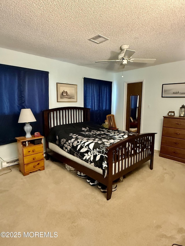 7 S Seas Ct, Barnegat, NJ 08005 - bedroom featuring carpet floors, a textured ceiling, and a ceiling fan