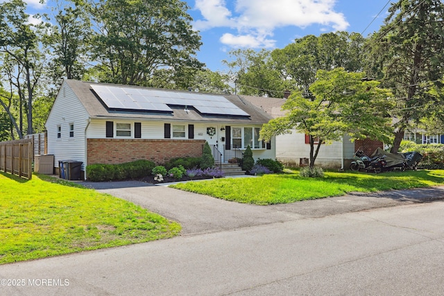 602 Butler Ave, Point Pleasant, NJ 08742 - view of front of property with roof mounted solar panels and brick siding