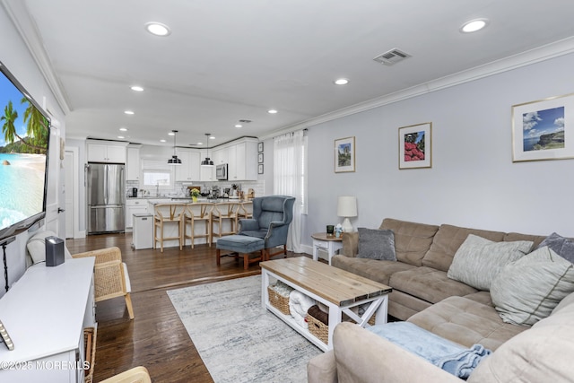 602 Butler Ave, Point Pleasant, NJ 08742 - living area featuring ornamental molding, plenty of natural light, recessed lighting, and dark wood-type flooring