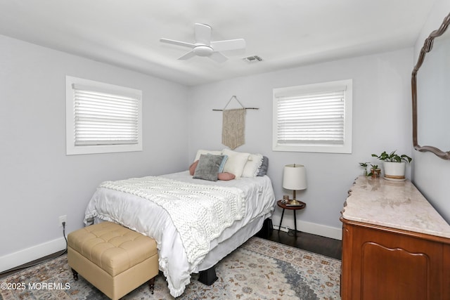 602 Butler Ave, Point Pleasant, NJ 08742 - bedroom featuring multiple windows, a ceiling fan, and wood finished floors