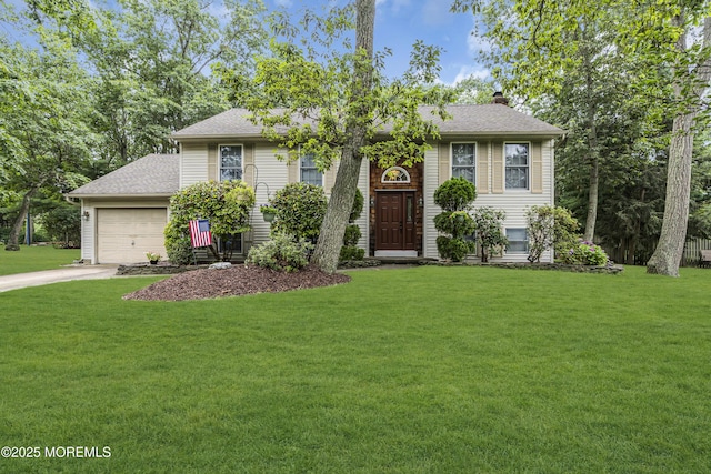 5 Partree Rd, Jackson, NJ 08527 - split foyer home with an attached garage, roof with shingles, a front yard, concrete driveway, and a chimney