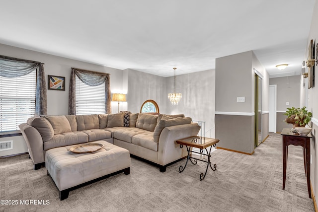 5 Partree Rd, Jackson, NJ 08527 - living room with attic access, light colored carpet, and a chandelier