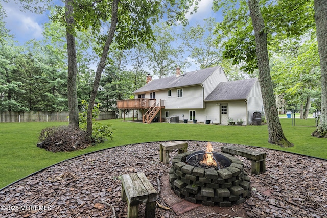 5 Partree Rd, Jackson, NJ 08527 - rear view of house featuring an outdoor fire pit, stairs, a deck, a chimney, and a fenced backyard