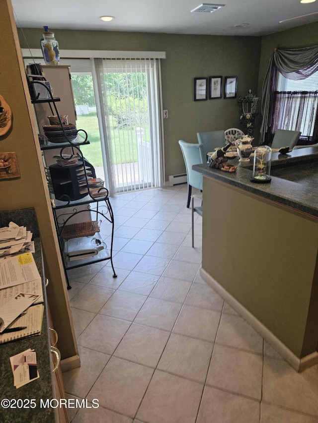 24 Christiansted St, Toms River, NJ 08757 - dining space featuring baseboard heating, light tile patterned floors, and recessed lighting