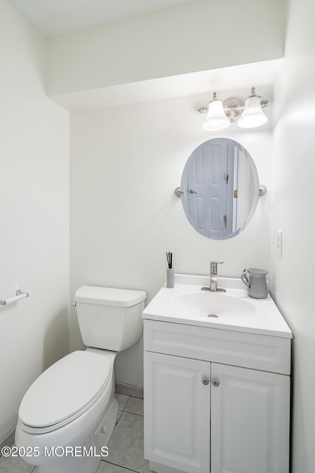 28 Dortmunder Dr, Manalapan, NJ 07726 - half bathroom featuring vanity and tile patterned flooring