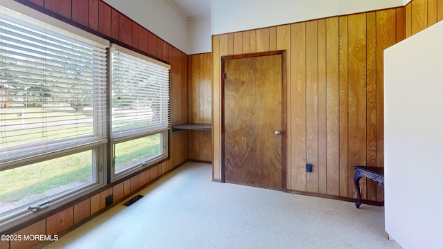 2 Patty Dr, Wrightstown, NJ 08562 - unfurnished bedroom featuring wooden walls, multiple windows, and carpet flooring