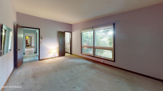 2 Patty Dr, Wrightstown, NJ 08562 - unfurnished bedroom with light colored carpet and baseboards