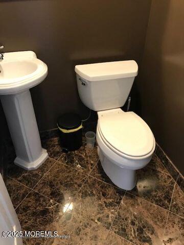 101 Village Green Way, Hazlet, NJ 07730 - half bathroom featuring toilet and baseboards
