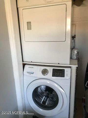 101 Village Green Way, Hazlet, NJ 07730 - laundry room with stacked washer / drying machine