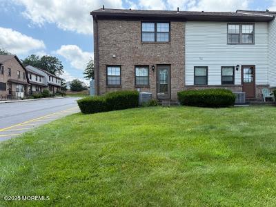 101 Village Green Way, Hazlet, NJ 07730 - traditional-style home with a front lawn