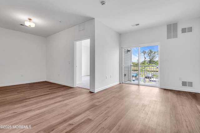 750 Lighthouse Dr Unit 3201, Barnegat, NJ 08005 - unfurnished room featuring wood finished floors and a smoke detector