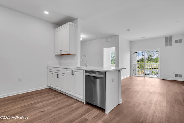 750 Lighthouse Dr Unit 3201, Barnegat, NJ 08005 - kitchen featuring dishwasher, light wood-style flooring, a peninsula, white cabinetry, and recessed lighting