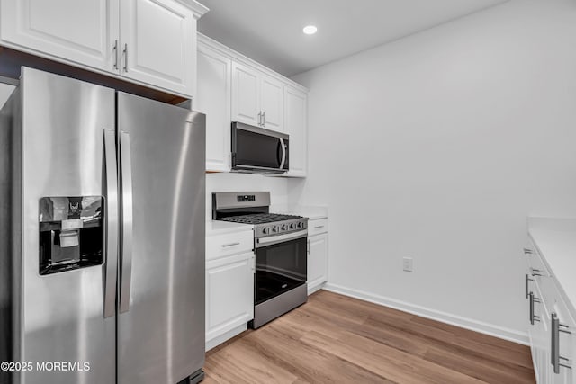 750 Lighthouse Dr Unit 3201, Barnegat, NJ 08005 - kitchen with appliances with stainless steel finishes, light wood-style floors, white cabinetry, light countertops, and recessed lighting