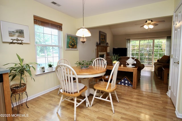 2 Dowing Ln, Jackson, NJ 08527 - dining area featuring light wood-style flooring, ceiling fan, healthy amount of natural light, and vaulted ceiling