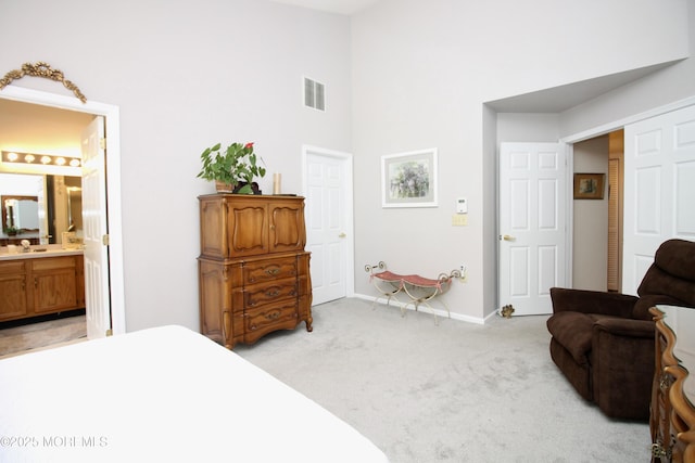 2 Dowing Ln, Jackson, NJ 08527 - bedroom featuring light carpet, a towering ceiling, and connected bathroom
