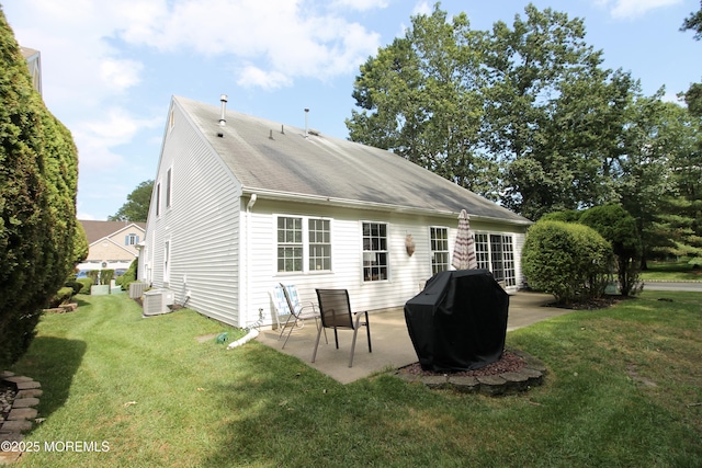 2 Dowing Ln, Jackson, NJ 08527 - rear view of house with a patio area and a yard